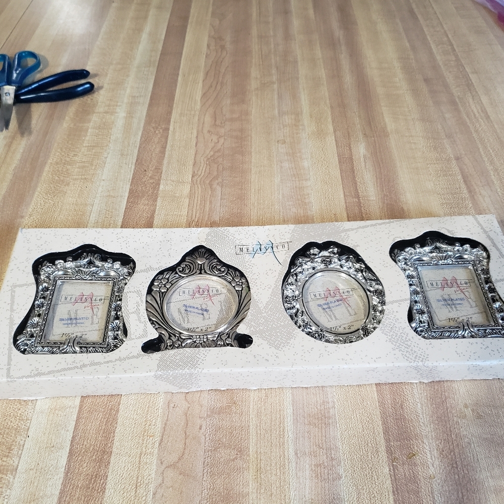 4 Small Silverplated Frames